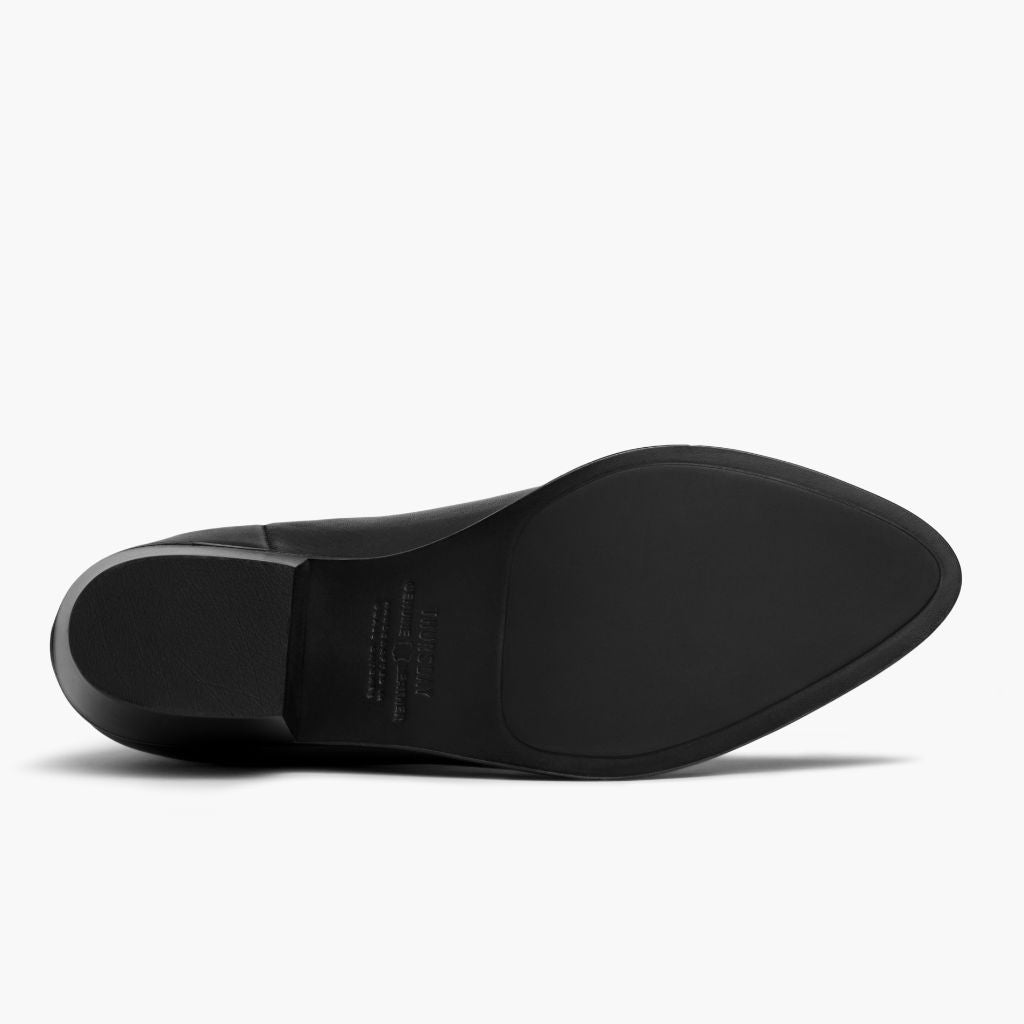 High-Traction Rubber Outsole & Lug Tread Pattern on Dreamer Bootie Negro Botas de cuero para Mujer