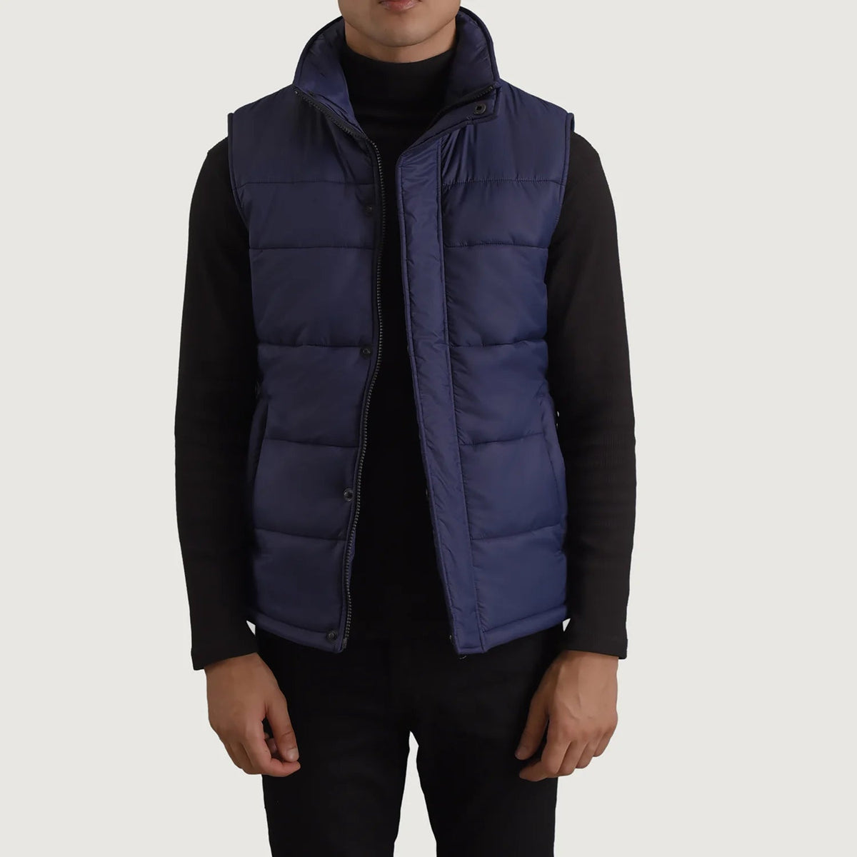 Bryan Azul Puffer Vest para Hombre in Blue Full-Grain Leather - Vista frontal y silueta a medida | Comprar online