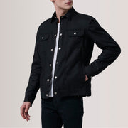 Colberto Negro Waxed Canvas Trucker Chaqueta de Cuero para Hombre For Men - Vista de perfil lateral con corte ergonómico de manga