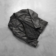 Styled Fit Perspective of Men's Ionic Black Leather Jacket on Model - Natural Daylight Drape