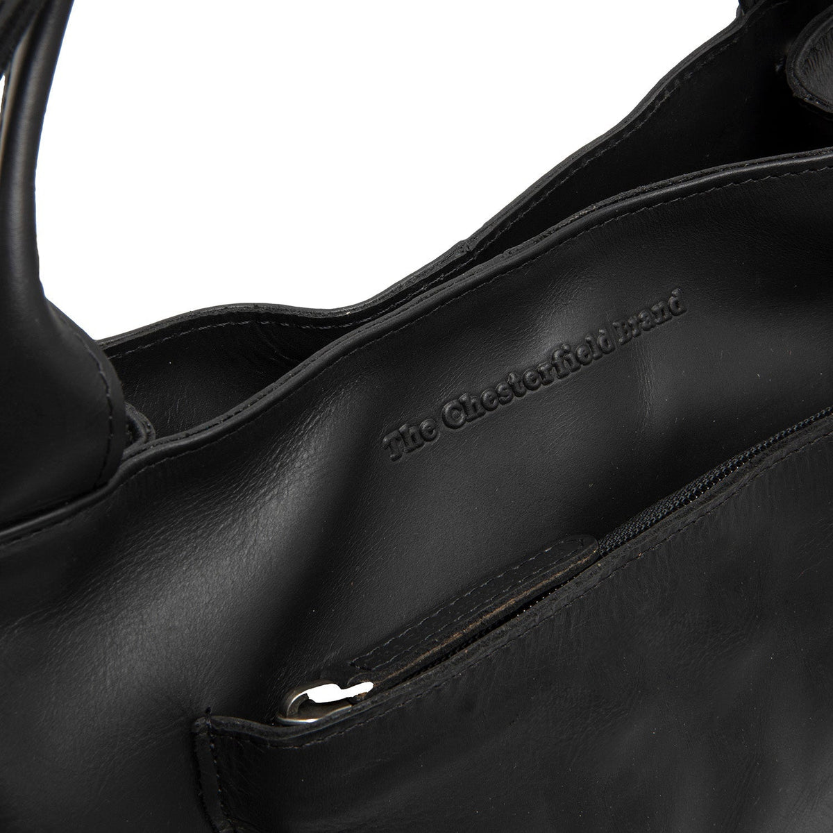 Tenara Full-Grain Leather Handbag para Mujer - Vista de perfil lateral con corte ergonómico de manga