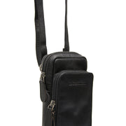 
Tailored Rib Cuffs & Hem Craftsmanship Construction Detail on Valdes Cuero Flor Integral Phone Bag