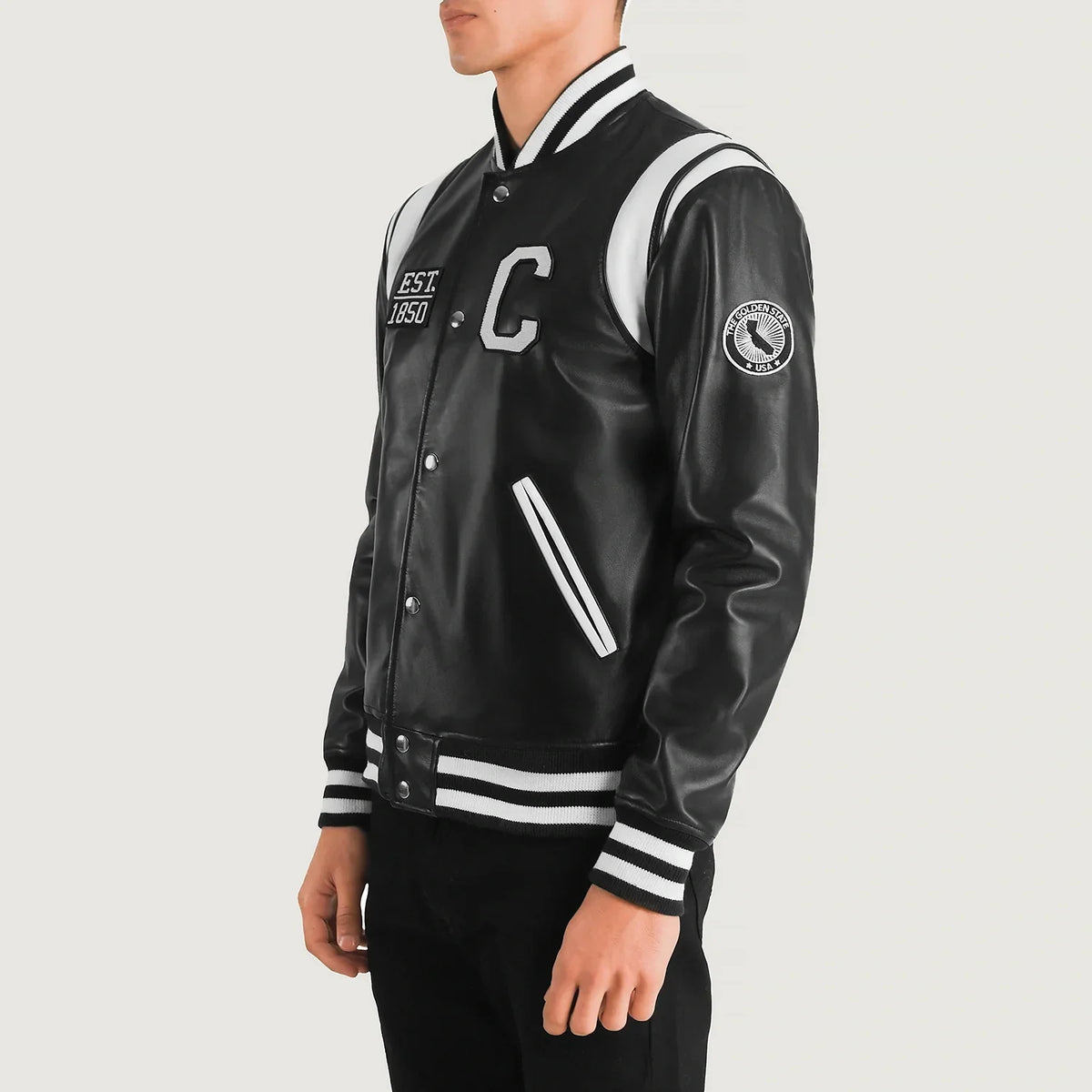 
Black & White Sheepskin Leather Varsity Jacket - Vista posterior con hombros definidos y bajo impecable